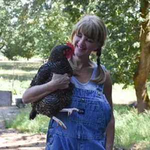 image of Ramona Youngquist holding a chicken