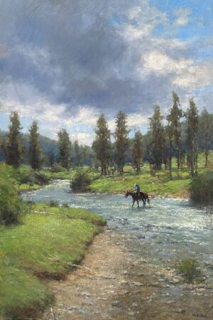 silhouette of man on horseback crossing a mountain stream