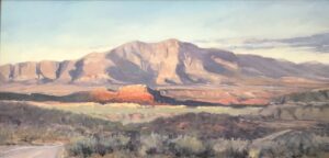 painting by Stephen Stauffer of Vallsy with a mountain in the background