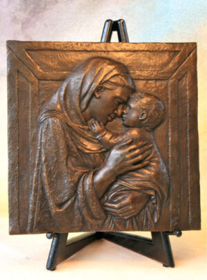 bronze relief by Anette Everette of Madonna and baby Jesus