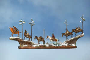 painted bronze sculpture by Fred Boyer of a group of horses in a line