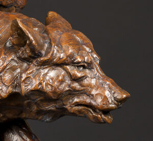 bronze sculpture of a wolf by Tim Shinabarger