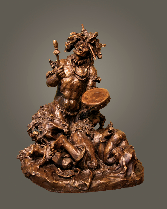 bronze sculpture by Scott Rogers of a native american playing a healing drum