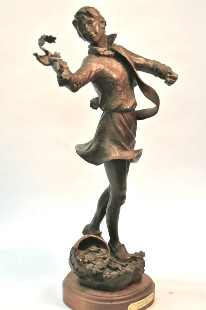 bronze sculpture by Annette Everette of a young girl twirling