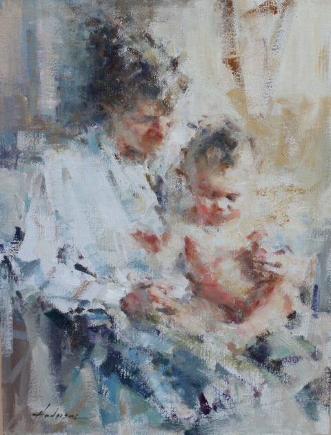 image of a woman holding a baby after a baby bath