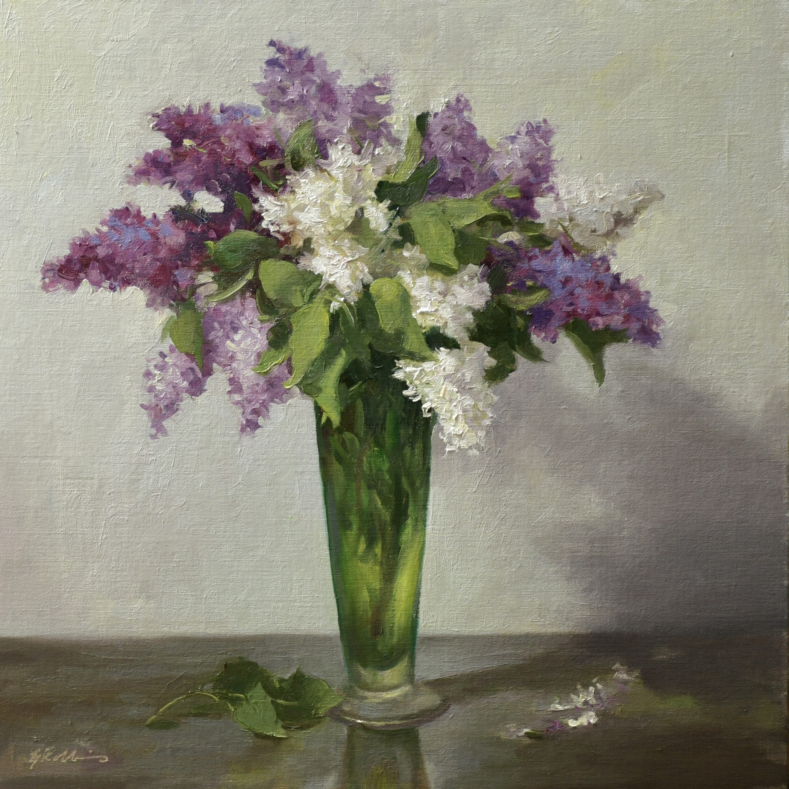 white and purple lilacs in a vase