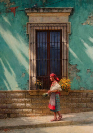 woman walking past a large window next to a pot of marigolds