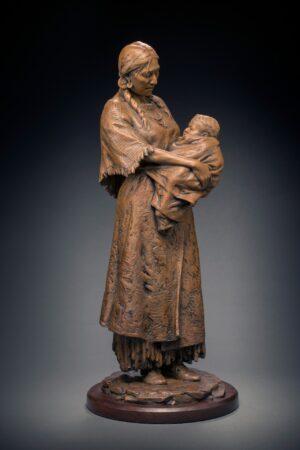 bronze of a woman holding and gazing down at her child