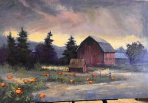 Picture of a pumpkin patch in front of a beautiful barn