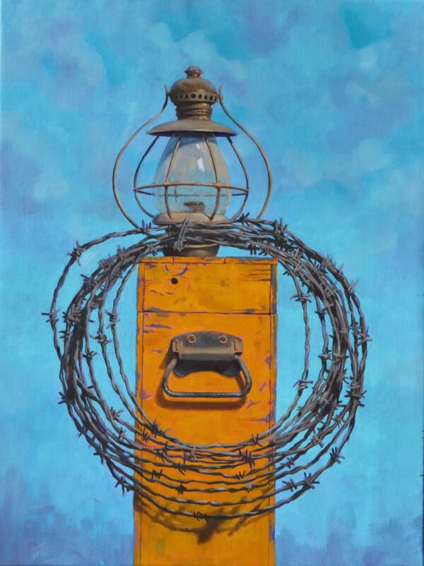 painting of a lantern and a coil of barbed-wire fence perced upon a wooden box with a metal handle on the side.