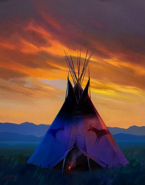 Teepee silhoutted against a dramatic sky with the purple haze of a mountain range in the background.