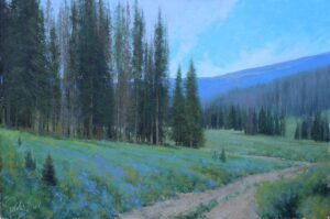 painting of.an early morning view of a dirt track with tall pines in the foreground and mountains in the background