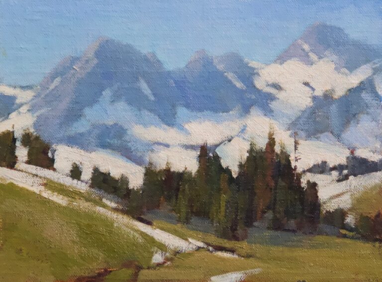 plein air study by Cindy Baron od a tall craggy mountain range behind a mountain meadow with evergreen trees