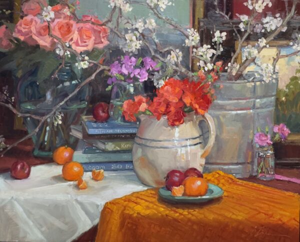 painting by suzie baker of a table with colorful flowers in vases, a small stack of books and some fruit in a bowl