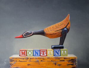 still life painting by Rich Alexander of a mallard duck carving perched on colorful blocks that spell Montana