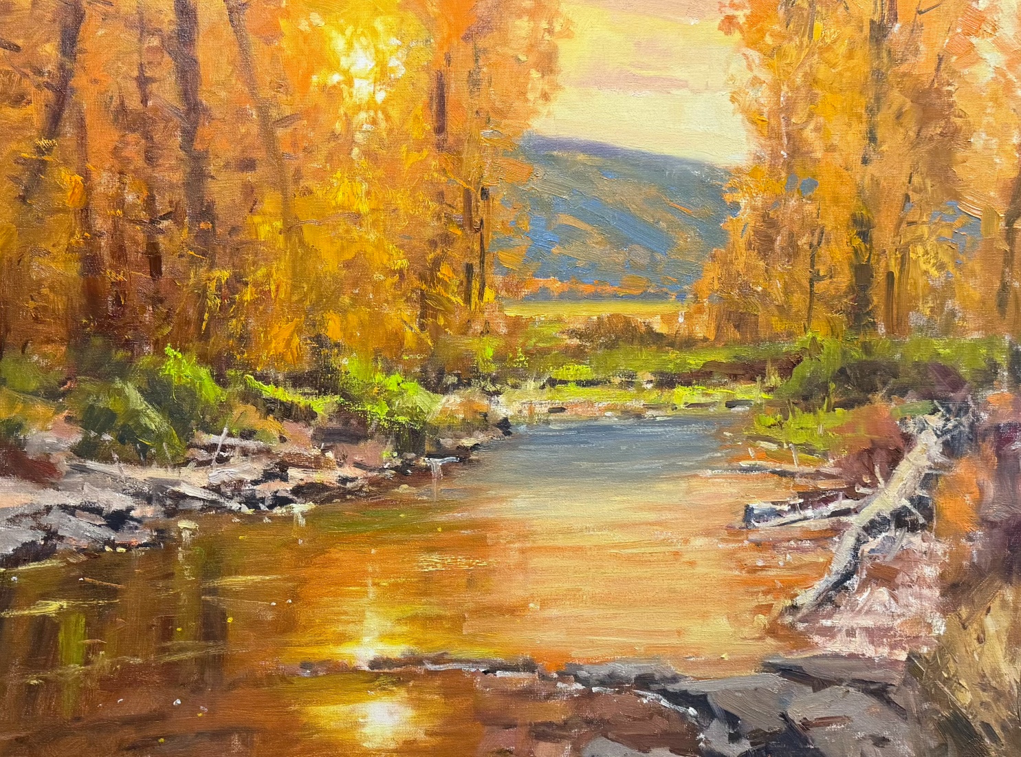landscape painting by Rusty Jones of a stream bounded by autumn orange and gold leafed trees