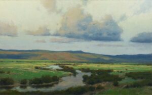 landscape painting by Ken Spencer of a mountain creek meandering through a valley, with a mountain ridge and big sky with clouds in the background.