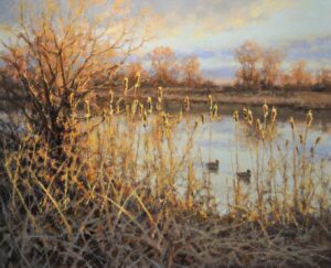 landscape painting by Greg Scheible of a mountain creek in a valley with brown grasses and with a mountain range in the far distant background